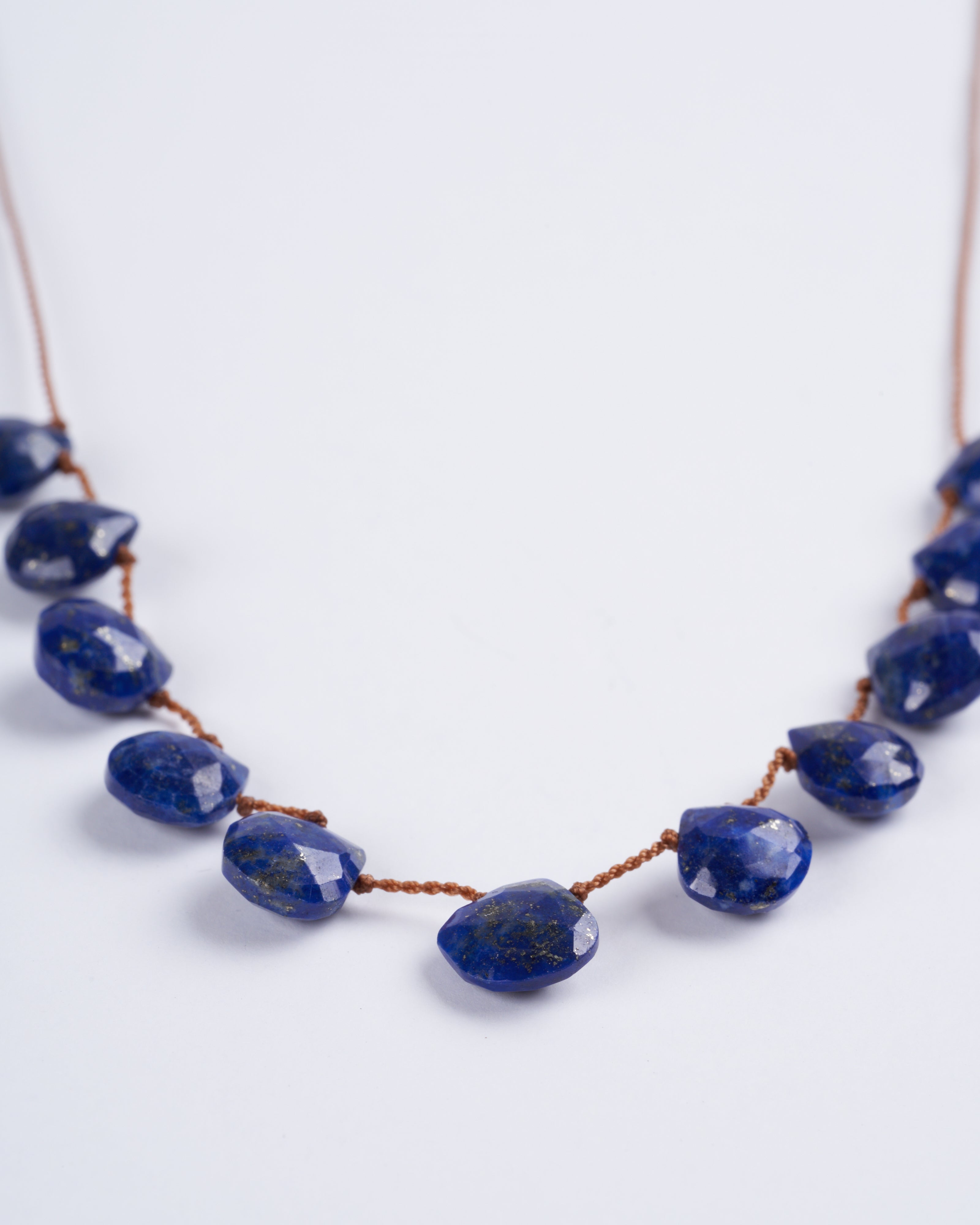 lena skadegard, 11 stone lapis tassel necklace - stone