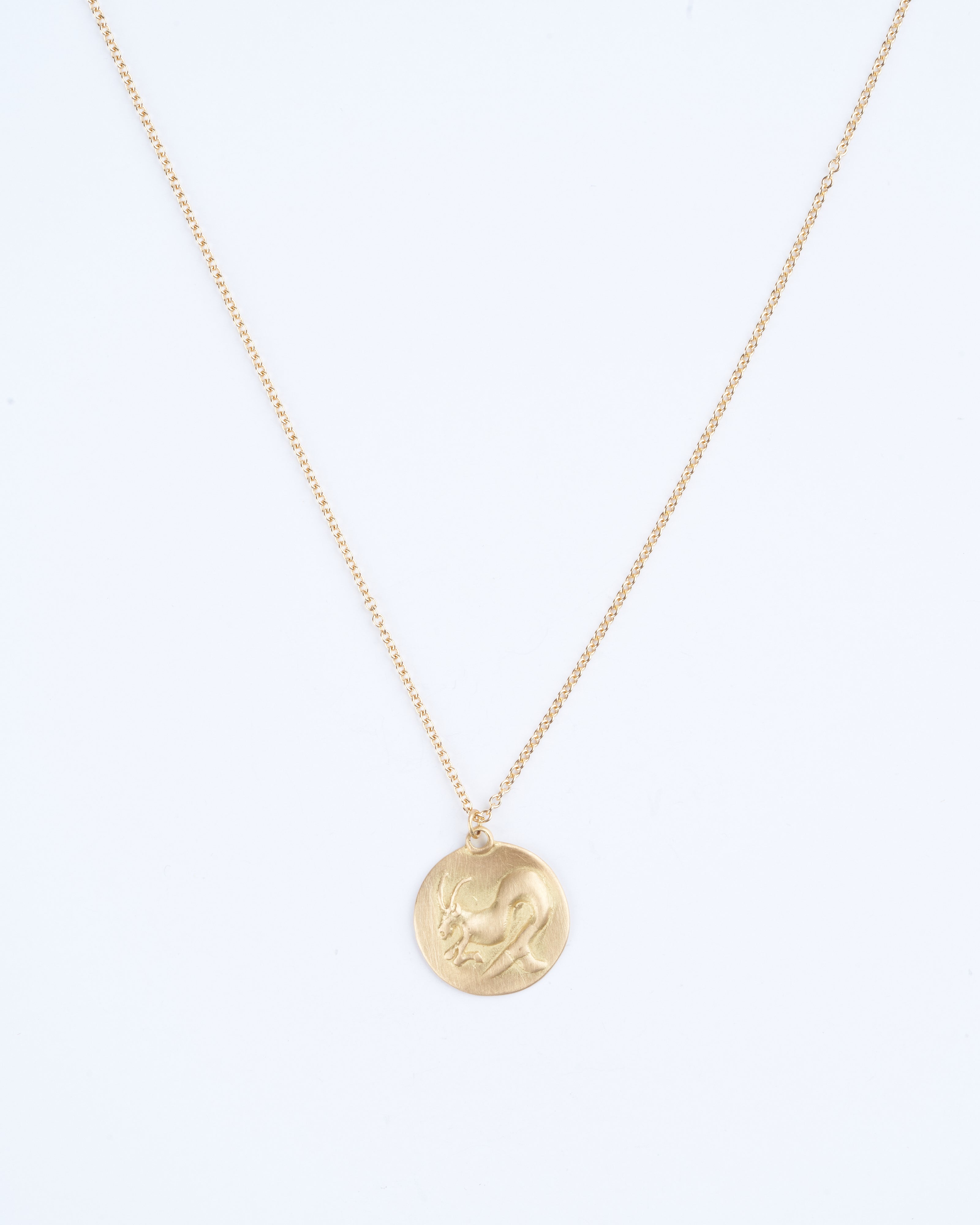 marian maurer, capricorn disc necklace - yellow gold